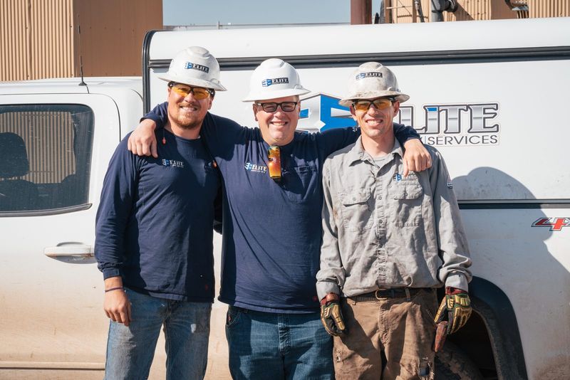 Elite field crew with a service truck
