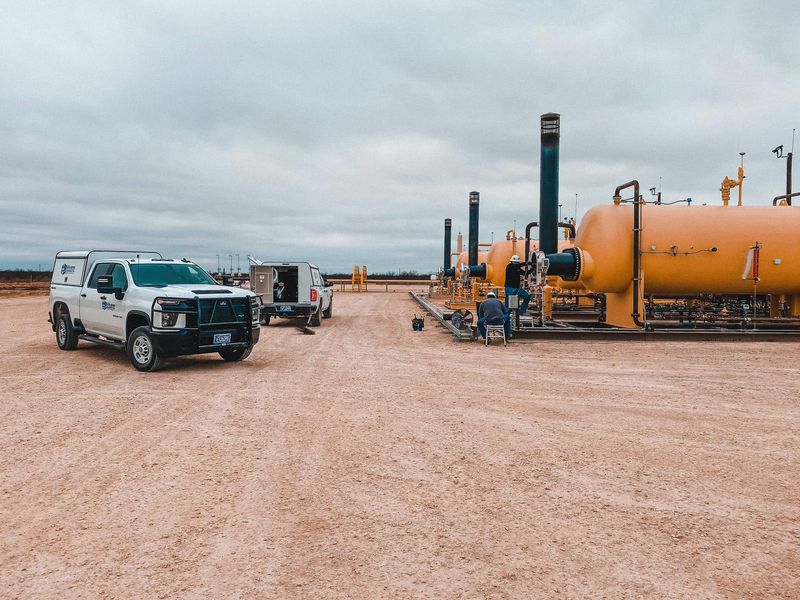 Elite service trucks on a well site